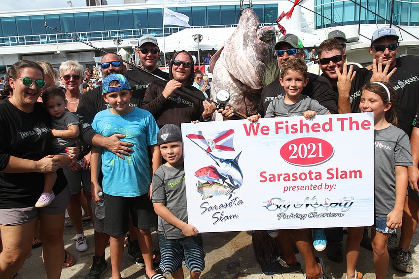 The Double Nickel team with its record-breaking 400 pound grouper.