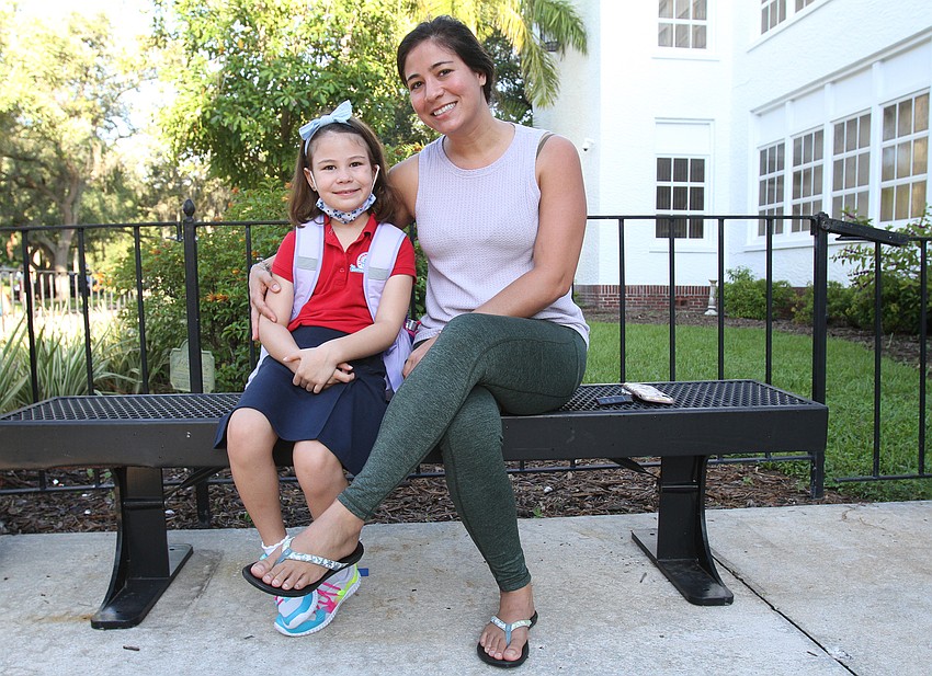 Melissa and Ella Ieradi wait for the day to start at Southside Elementary School.