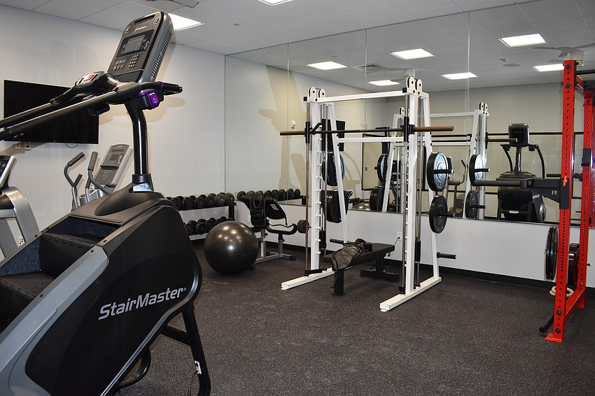 Station 92 gym is finished. It features a treadmill, rowing machine, StairMaster and weight equipment.