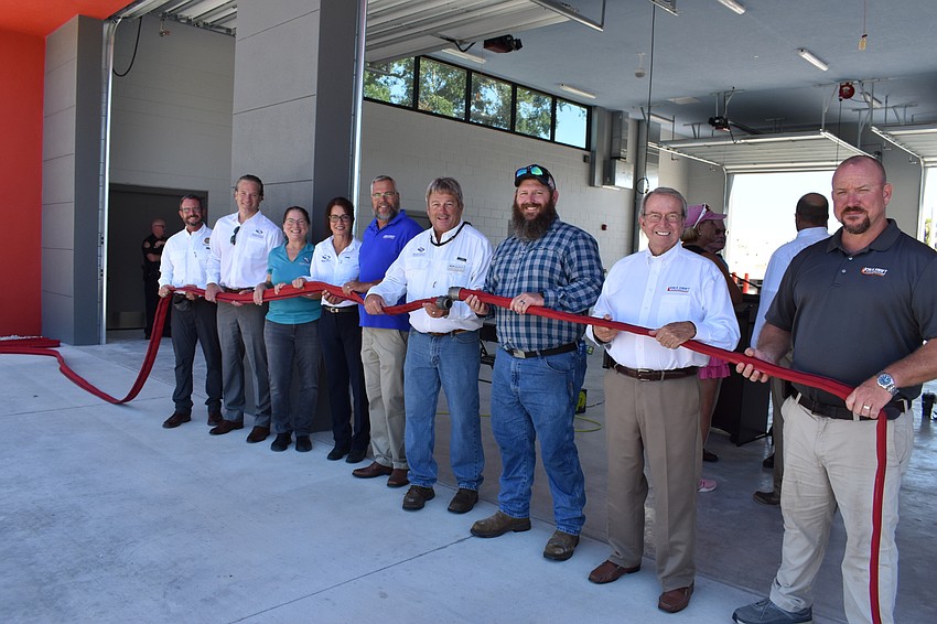Charlie Mopps, Tom Iarossi, Jennifer Newman, Caryn Huff, Ross Russo, Doug Whisler, Shane Hamm, Jon Swift and Jonathan Swift posed for a photo on Wednesday morning.