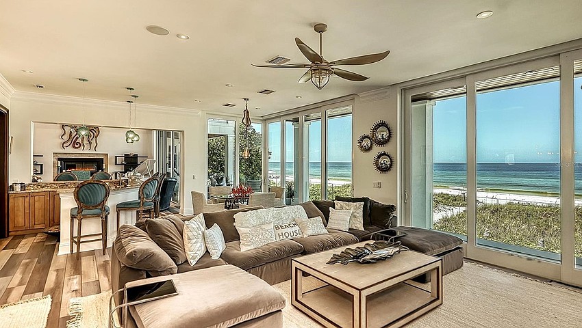 The home overlooks 151 feet of beachfront.