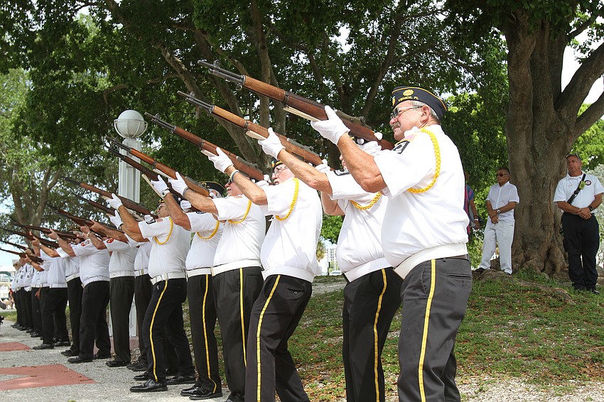 VFW members fire their guns in respect.