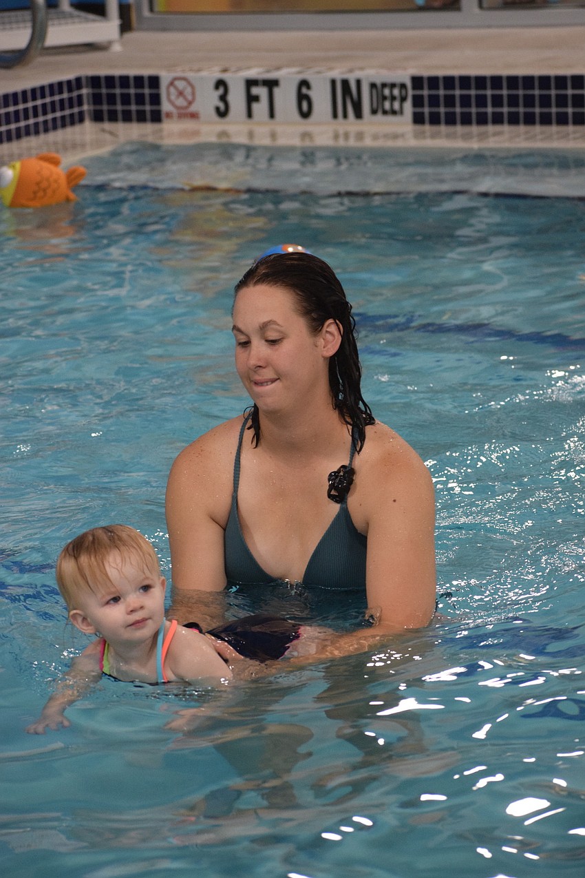 Parrish's Averie Cutlip, who is 1, is pushed along in the pull by Robyn Lebuffe.