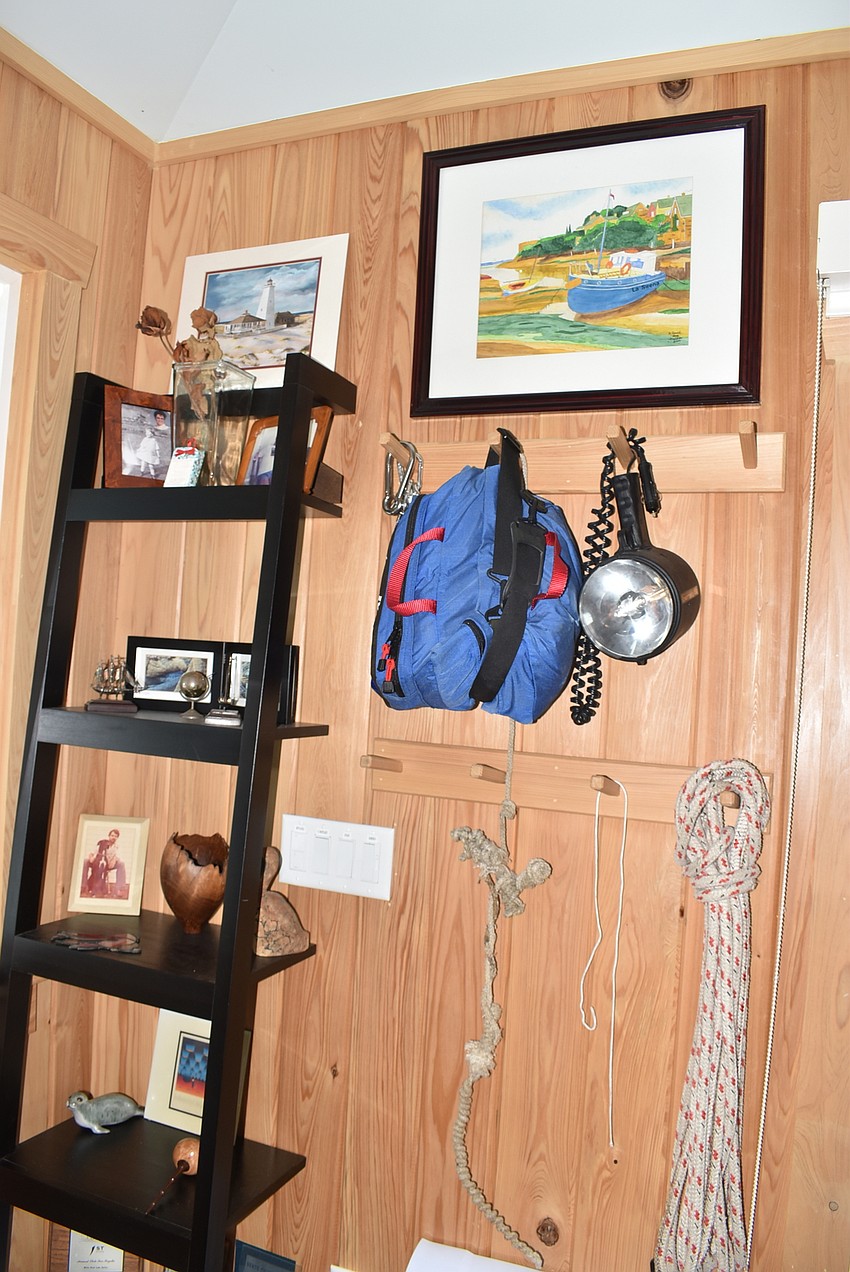 Historic photos and sailing gear decorate the nest.