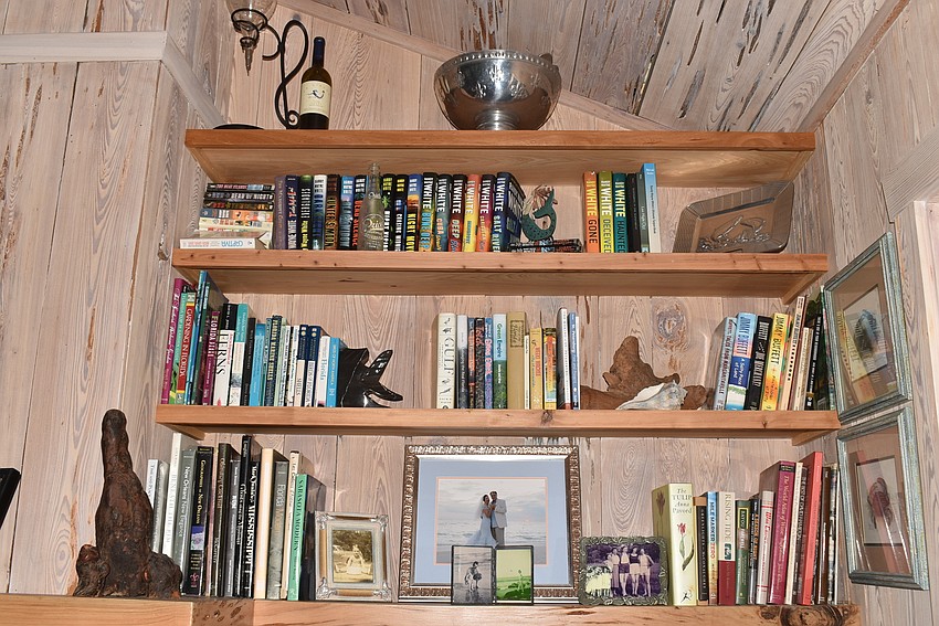 The living room smells of the pecky cypress that makes up the walls.