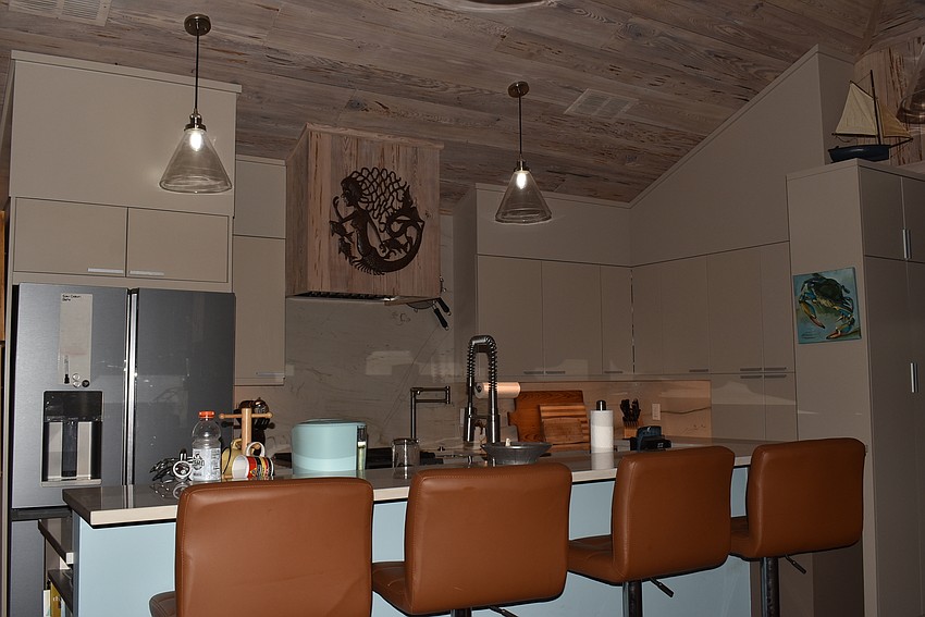 The kitchen renovation benefited from newly vaulted ceilings.