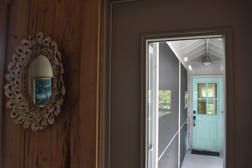 Putting a roof over the walkways to other buildings meant that the house is now one entity.