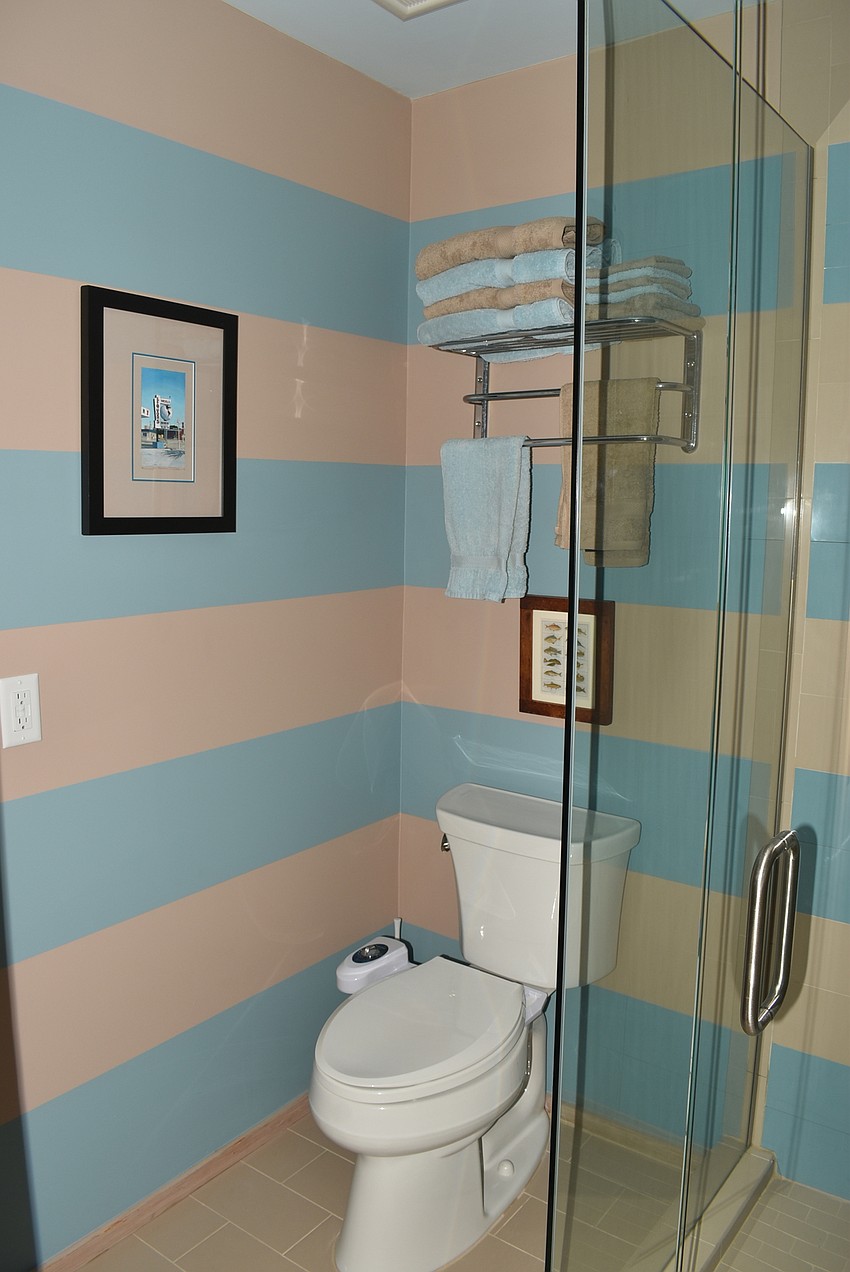 The Prices refinished the bathrooms with Floridian touches.