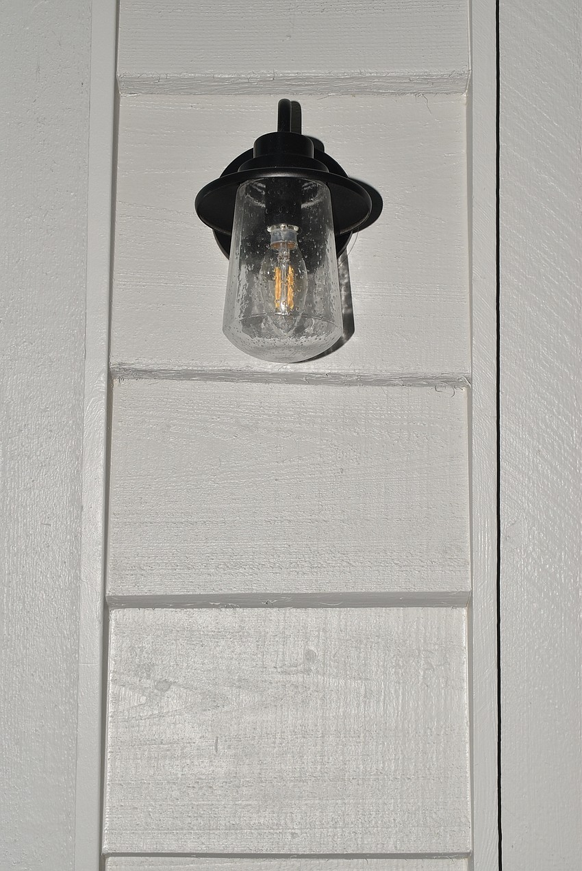 The rough cypress siding is still abundant in the home.