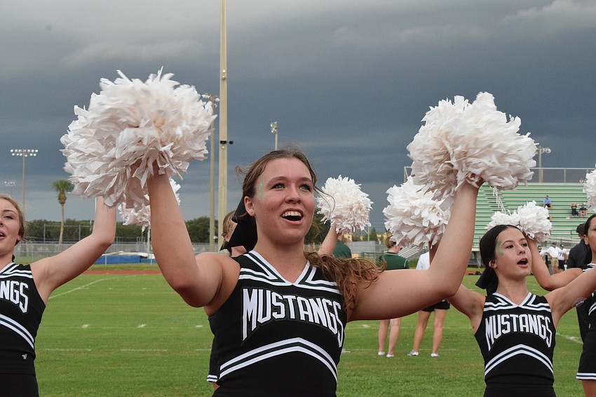 Kennedy Burnette chants with pride for her school.