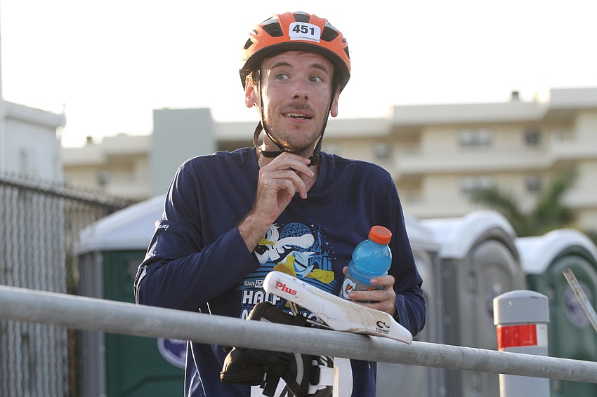 Doug Clark parks his bike.