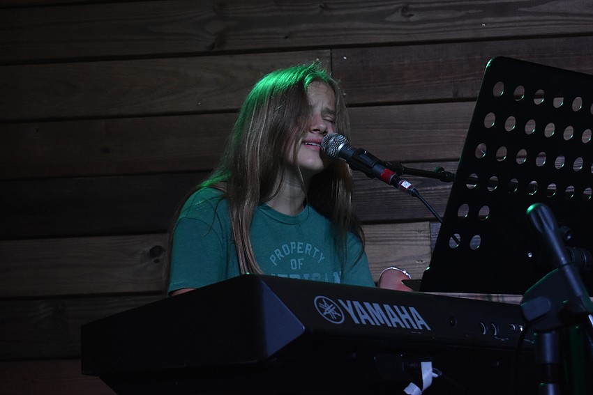 Amiee Mongiovi plays piano.