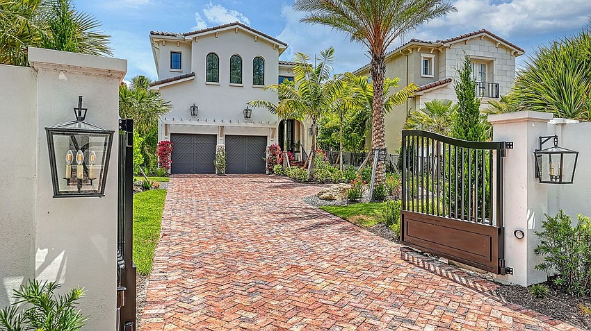 The Siesta Key home at  7949 Midnight Pass Road  was built in 2020. It has four bedrooms, four baths, a pool and 4,904 square feet of living area.