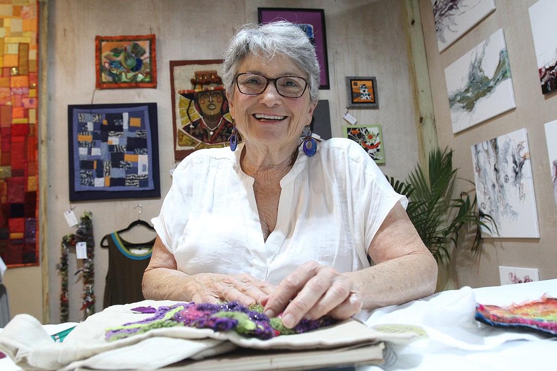 Lori Stone says it&#39;s been a fun change to have new people see her fabric art.