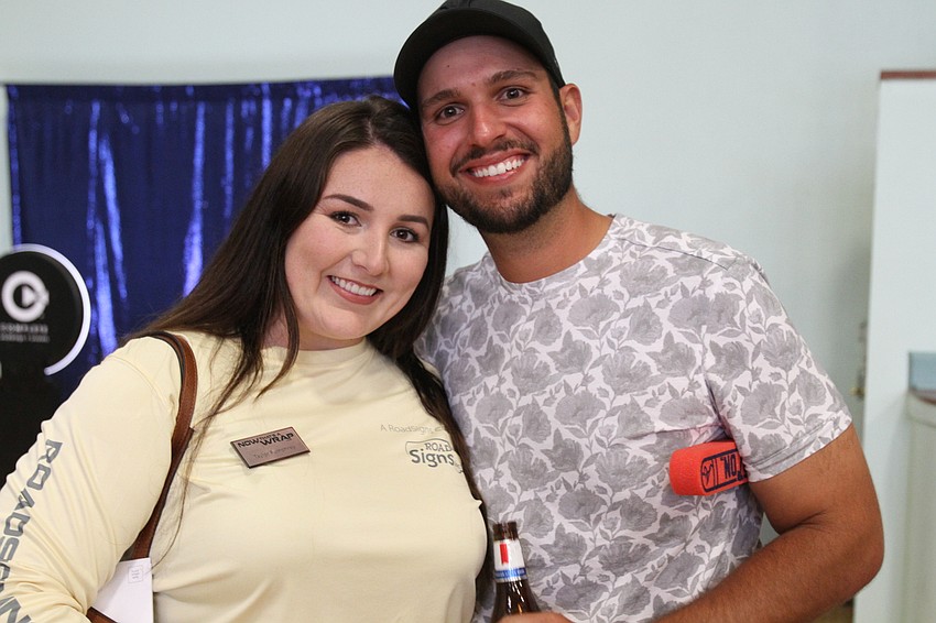 Taylor Pumphrey and Eric Lisabet are all smiles.