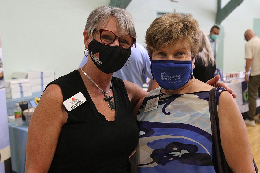 Joan Leonard and Sue Weber-Hegge wore masks.