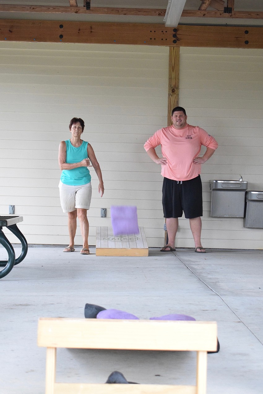 Lakewood Ranch's Mollie Saia goes up against Chris McComas with Lakewood Ranch Community Activities.