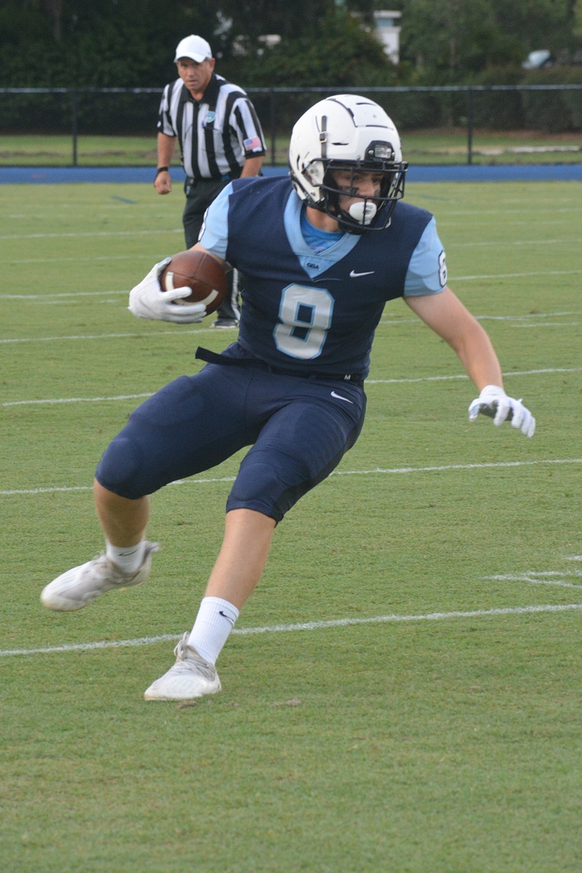 ODA sophomore Charlie Tack turns upfield after catching a pass from Connor Pope.