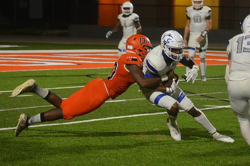 Sailors linebacker Kafale Rivers makes a tackle on a late Barron Collier kickoff return.