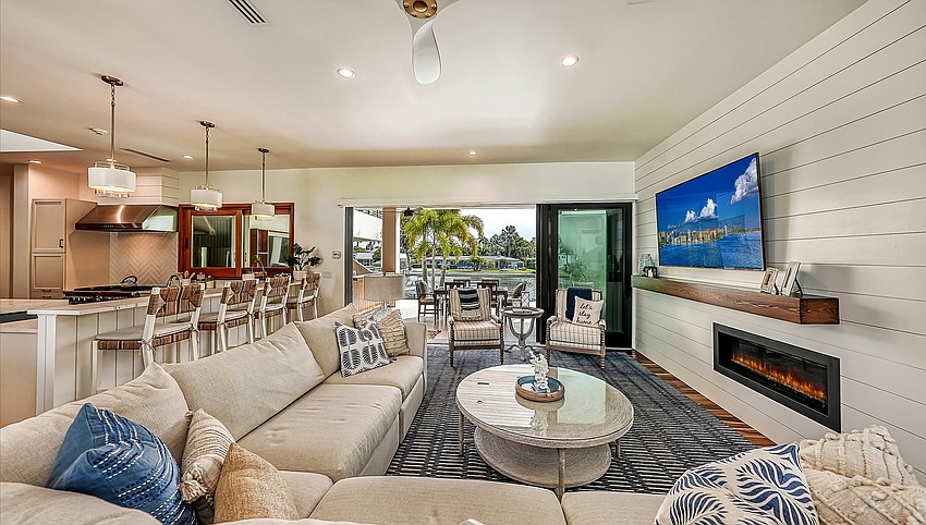 The ground floor living space overlooks a canal on Lido Key.