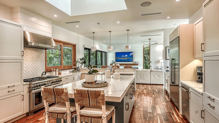 The home's kitchen flows into the living area.