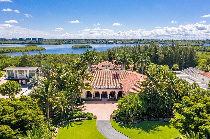 The home is across Little Sarasota Bay from Historic Spanish Point.