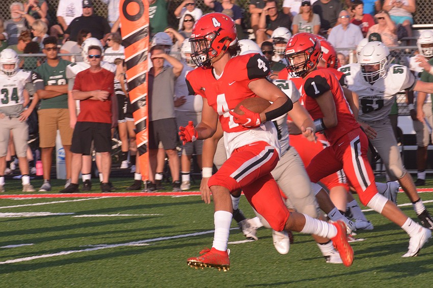 Cardinal Mooney freshman Ryan Matulevich gets the ball on a wide receiver reverse.