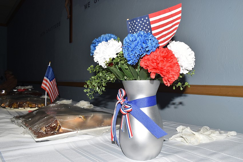 The Women's Guild made the desserts, which waited by patriotic displays.