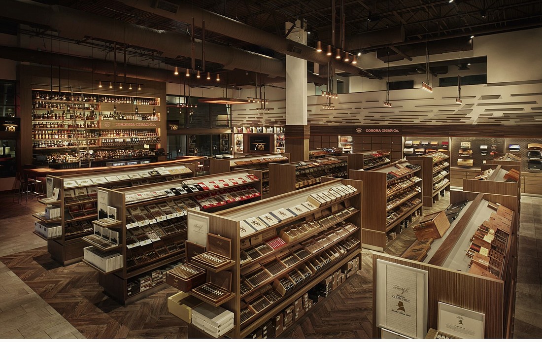 Jeff Borysiewicz said his shops derive the majority of their revenue from retail sales, but the presence of a bar and late-night hours drew concern from some downtown residents. Image courtesy Corona Cigar Company.