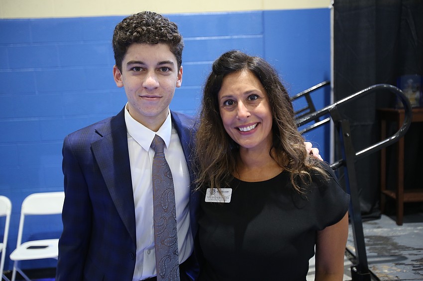 Club member Jorge Hernandez-Perez with vice president for advancement Yolanda Mancha