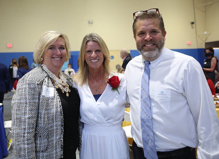 Michelle Cherp, honoree Lisa Bechtold and Tommy Kochis