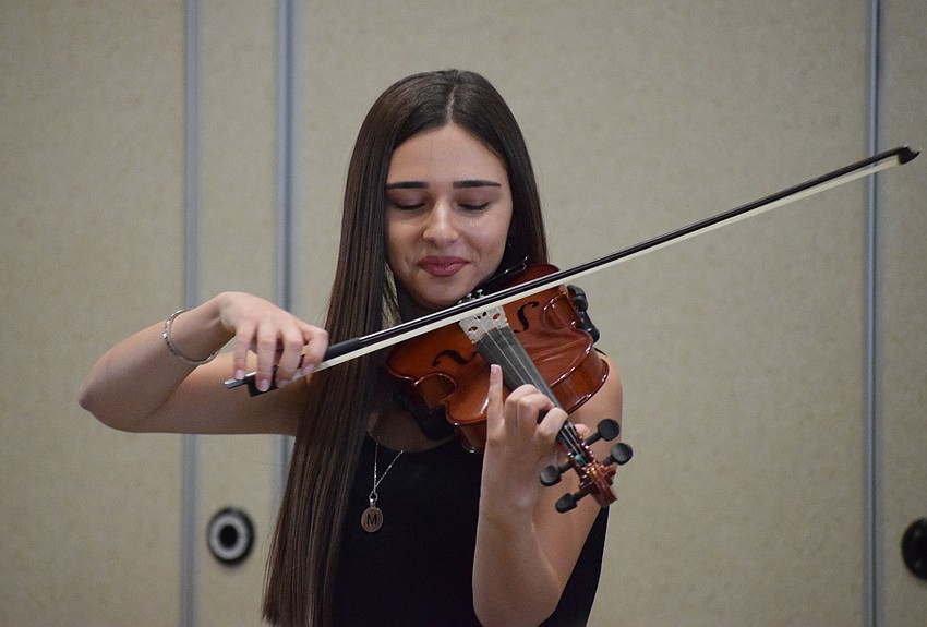 Margarita Zakyan plays her violin with passion.