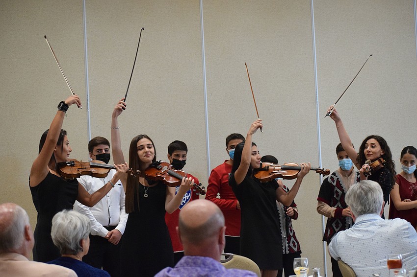 Alisa Darbinyan, Margarita Zakyan, Monika Avanesyan and Margarita Kritikashyan finish performing their first piece.