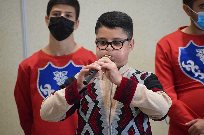 Narek Khanzadyan performs a solo with an Armenian flute called a duduk.