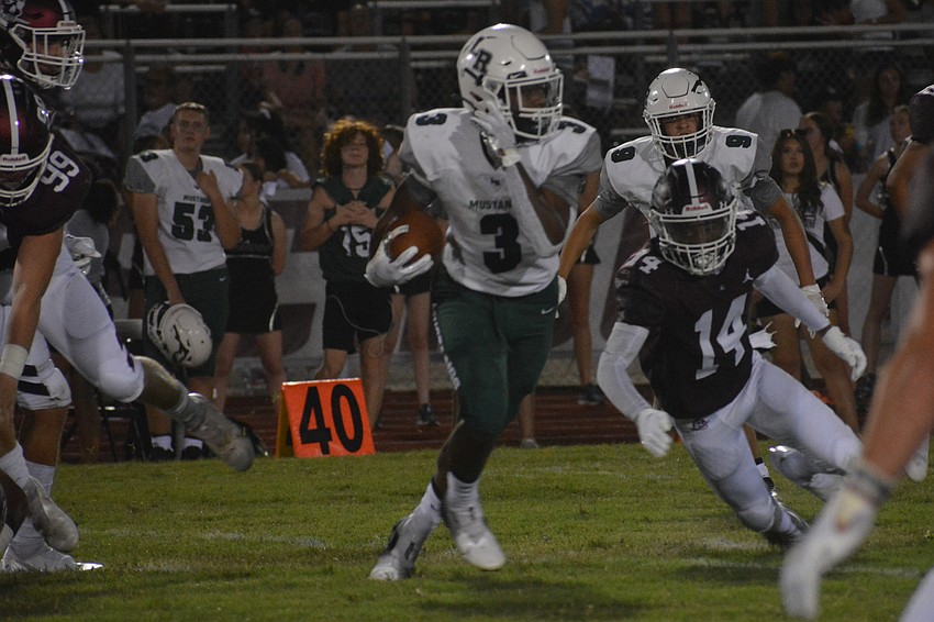 Lakewood Ranch running back Kevin Everhart bursts through the Braden River defense.
