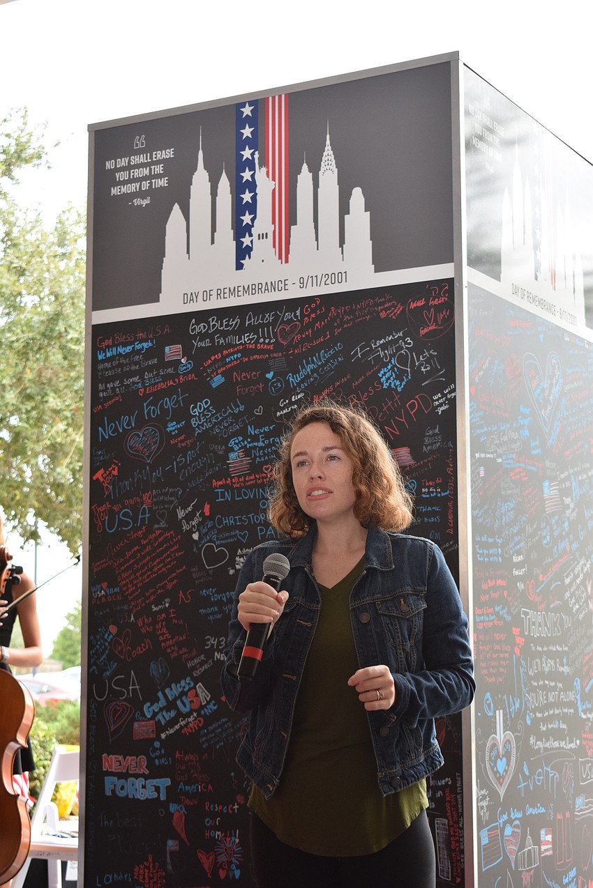 Sarasota's Erika Miller sang the National Anthem in front of the specially designed cube to record memories and thoughts of  9/11 at Main Street at Lakewood Ranch.