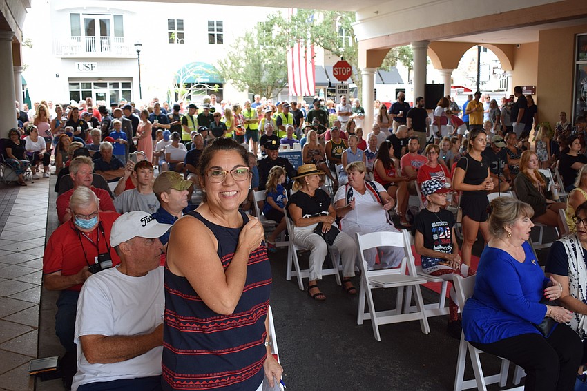 East County Observer Associate Publisher Lori Ruth (front) helped organize Day of Remembrance at Main Street at Lakewood Ranch. Hundreds attended.