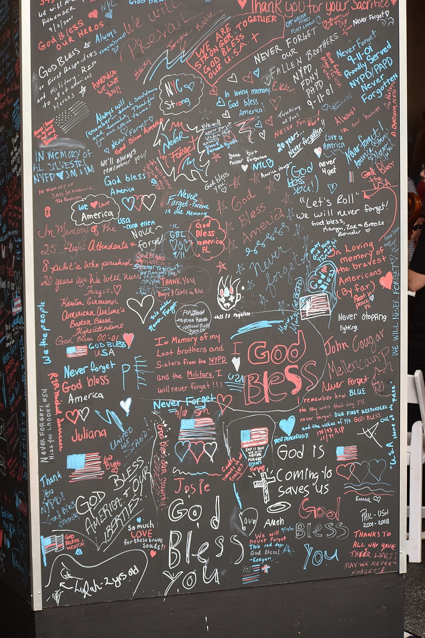 Every inch of blackboard space on the cube, which was designed by Fawley Bryant and built by Willis Smith, was covered with thoughts and memories of 9/11.