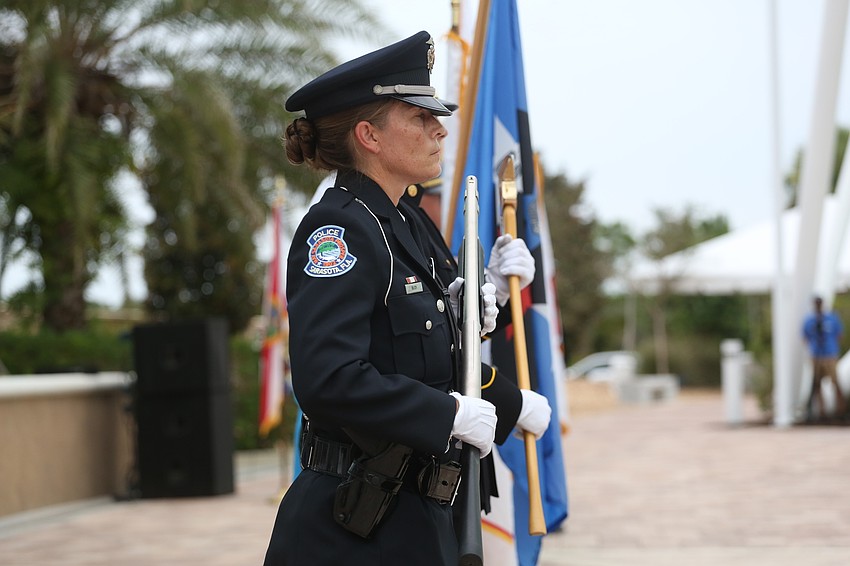 Sarasota police, fire and sheriff honor guard figures performed the posting of the colors.