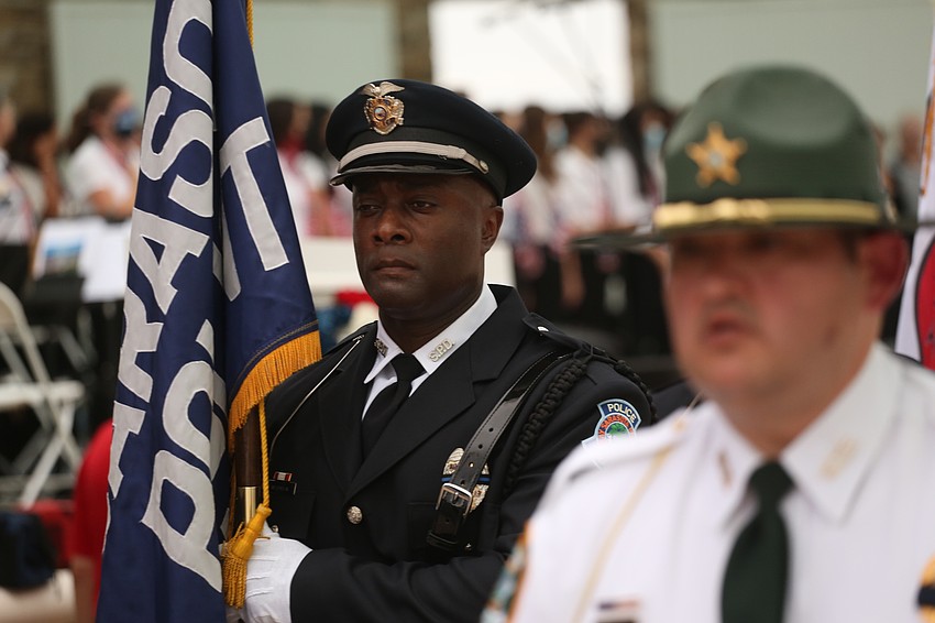 Sarasota police, fire and sheriff honor guard figures performed the posting of the colors.