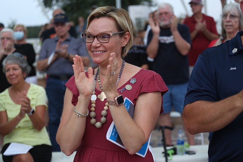 Allie Cooper claps in respect.