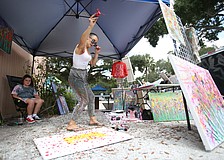 Drita Hajroja of the Drita Dawn business works on her art.