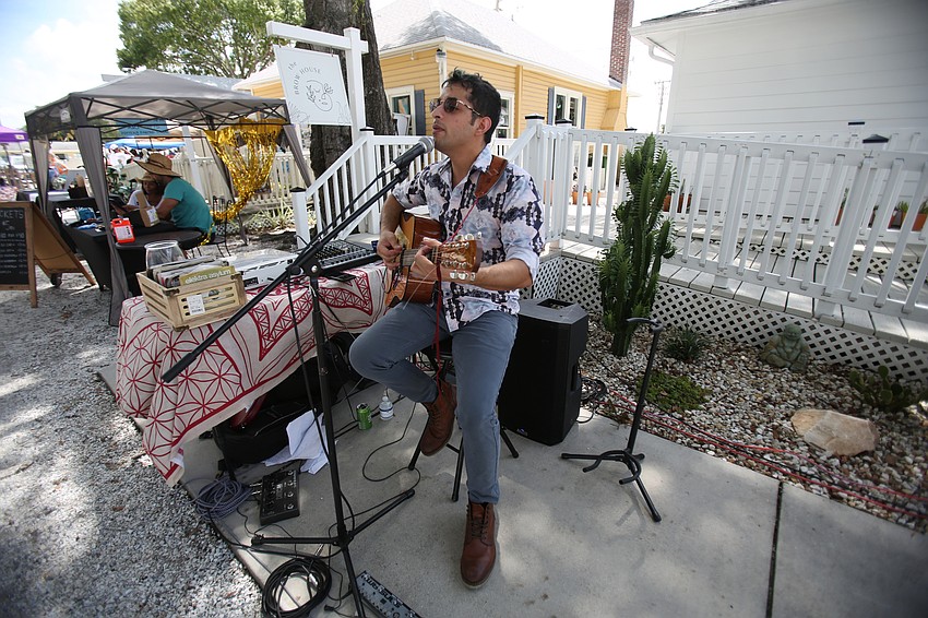 Sean Adam Walsh plays music for guests throughout the day.