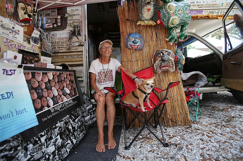 Paula Knudsen sold her frumple art with Mango the dog.