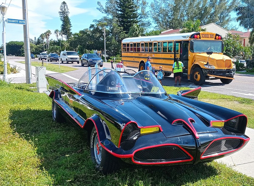 Neighborhood kids got a chance to sit in the Batmobile. Courtesy photo.