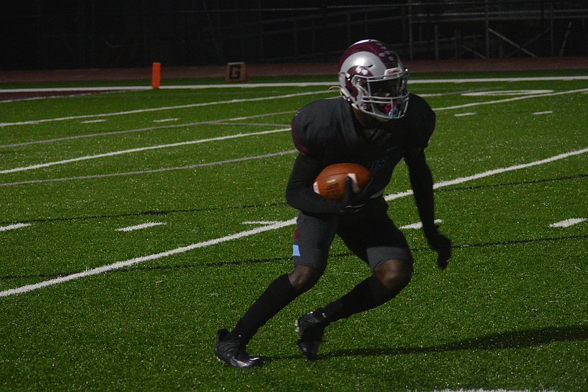 Johnell Williams returns a kickoff for Riverview.