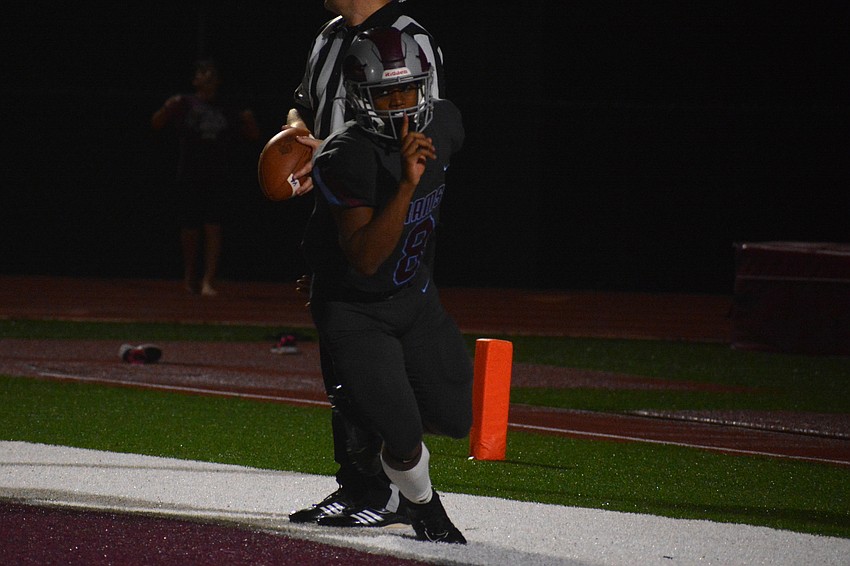 Rams running back Jay'den Birch gives a 