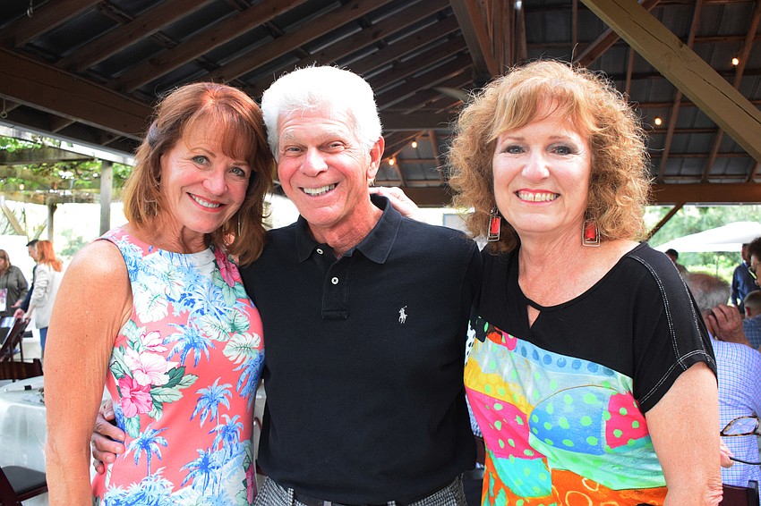 Country Club East's Lynn Marconi and Tony Monzo and Country Club's Linda Dirk look forward to watching dogs walk the red carpet.