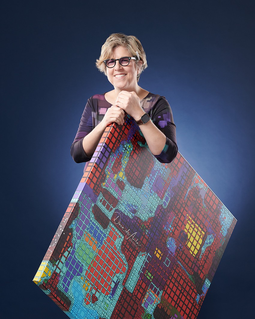 Diana de Avila with a canvas of 