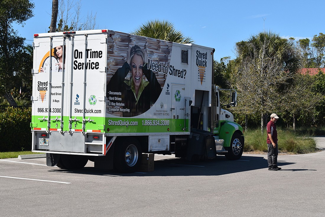 A ShredQuick truck shredded paper documents at the town of Longboat Key&#39;s community open house in March 2020. Photo: Nat Kaemmerer
